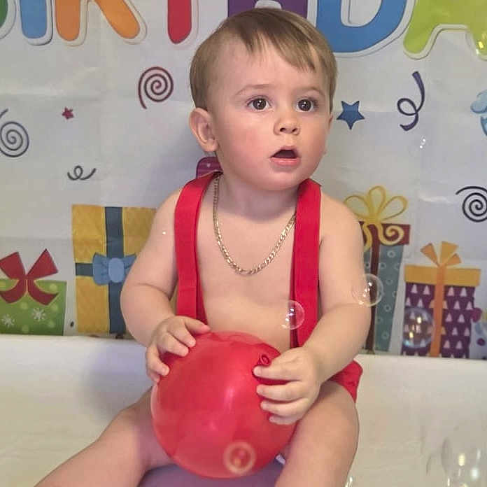 Sonnie- Lee is registered to the contest to win money with this photo: accessories, baby, ball, balloon, bathing, crawling, face, football, head, jewelry, necklace, people, person, photography, portrait, sitting, soccer, soccerball, sphere, sport