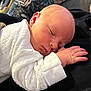 Gabriel participe au concours pour gagner de l'argent avec cette photo : baby, newborn, infant, sleeping, closed_eyes, peaceful, hand, onesie, white_clothing, swaddle, cheek, ear, portrait, close_up, indoor, soothing, couch, soft_texture, parent_lap, rest