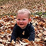 baby, child, smiling, autumn, leaves, outdoor, nature, playful, fall, cute, person, happy, seasonal, young_child, portrait, grass, woodland, fun, casual, daylight