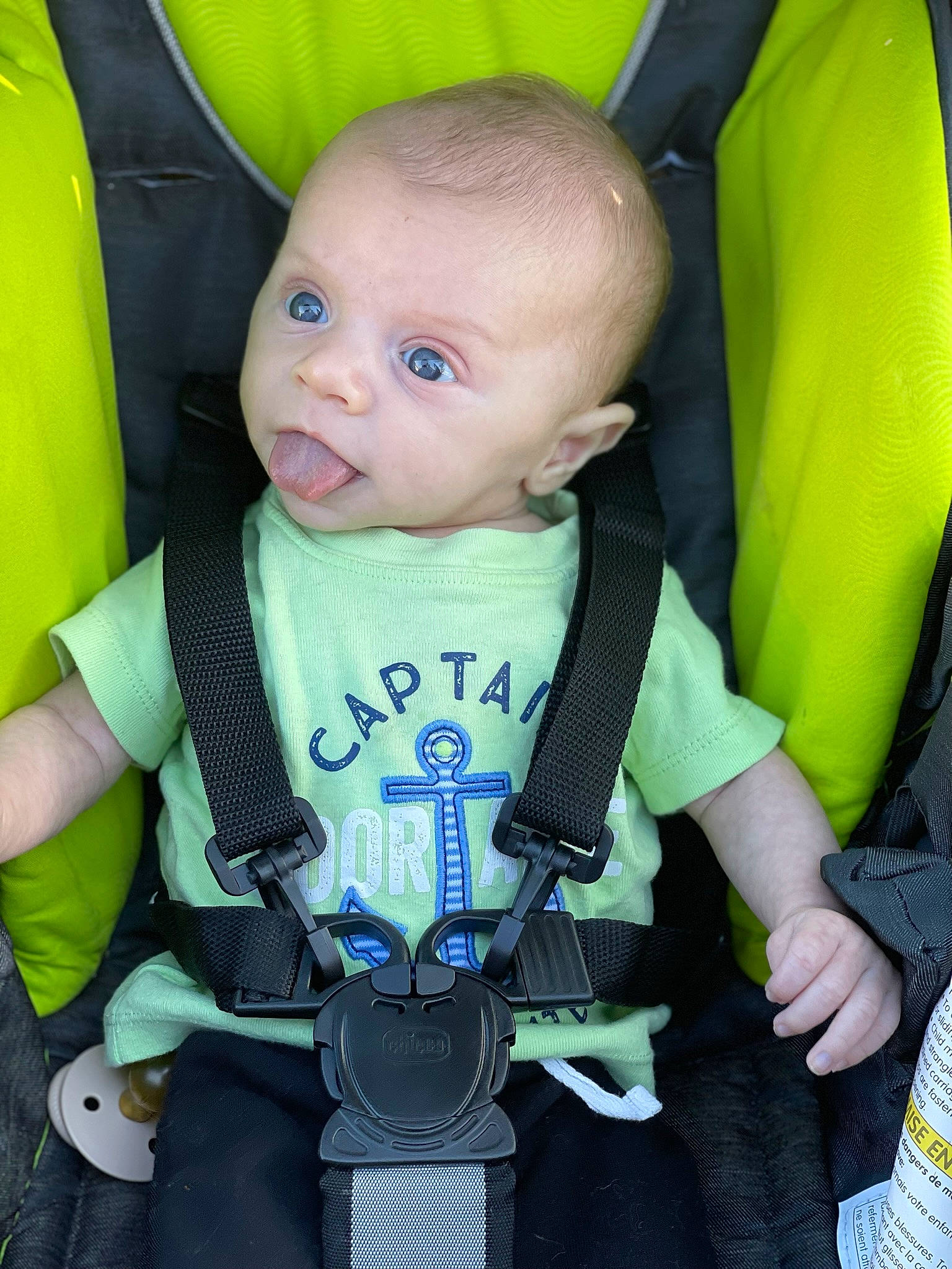 Jaxton is registered to the contest to win money with this photo: baby, baby_carriage, baby_products, baby_safety, baby_toddler_clothing, car_seat, cheek, child, electric_blue, green, iris, organ, person, personal_protective_equipment, photograph, product, seat_belt, sitting, skin, sleeve