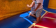 Alyvia joined the competition — help win amazing prizes! adult, barefoot, bounce_house, child, children, colorful, fun, grass, happy, inflatable, interaction, netting, outdoor, play, residential, shadow, shorts, summer, sunlight, tshirt