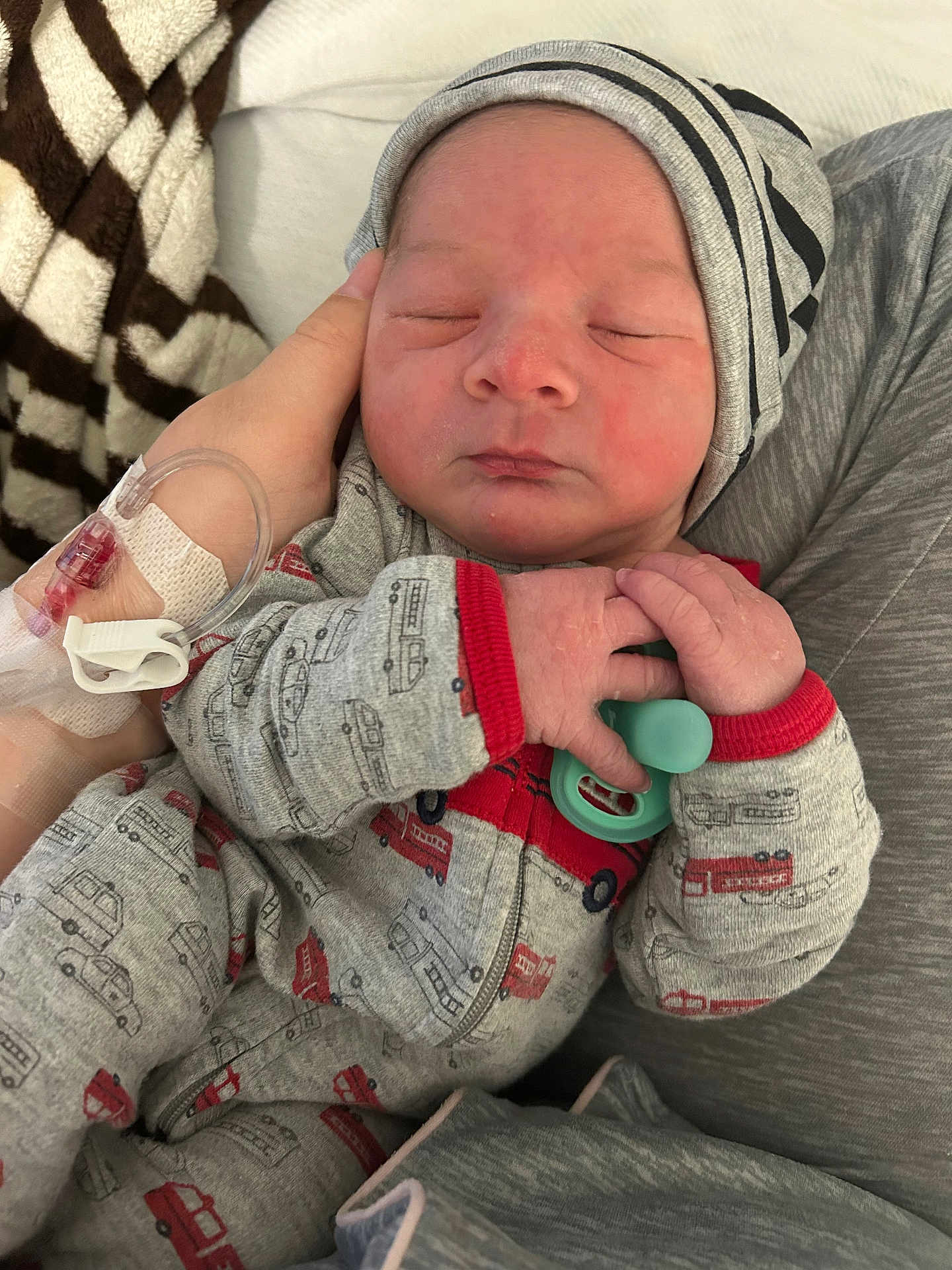 Kacey joined the competition — help win amazing prizes! newborn, baby, infant, sleeping, pacifier, hand, hospital, iv, clothing, gray, red, pattern, cute, soft, person, face, headwear, closeup, toddler, portrait