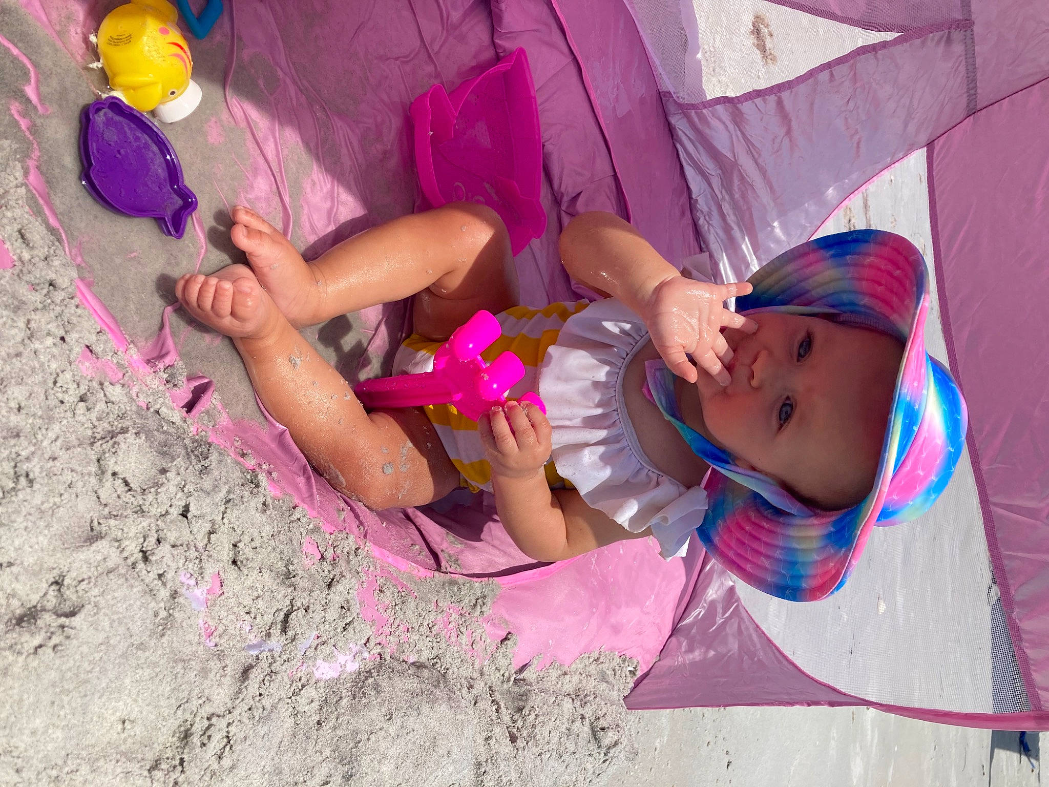 Lyric joined the competition — help win amazing prizes! baseball_cap, beach, child, cool, facial_expression, fun, happy, hat, headwear, human_leg, leisure, magenta, mouth, person, pink, purple, recreation, shorts, t_shirt, textile