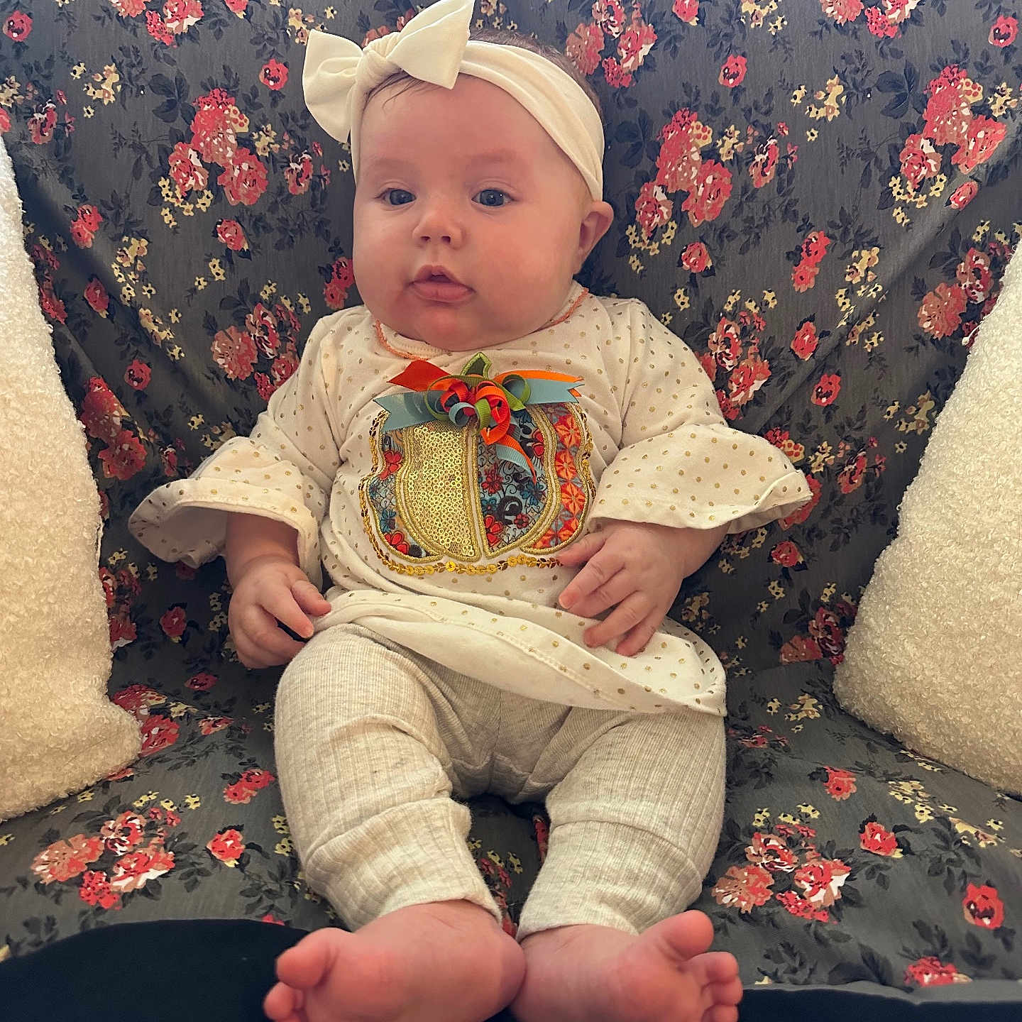 Dakota joined the competition — help win amazing prizes! architecture, baby, building, clothing, couch, cushion, face, furniture, hat, head, homedecor, indoors, livingroom, pants, person, photography, pillow, portrait, quilt, sitting