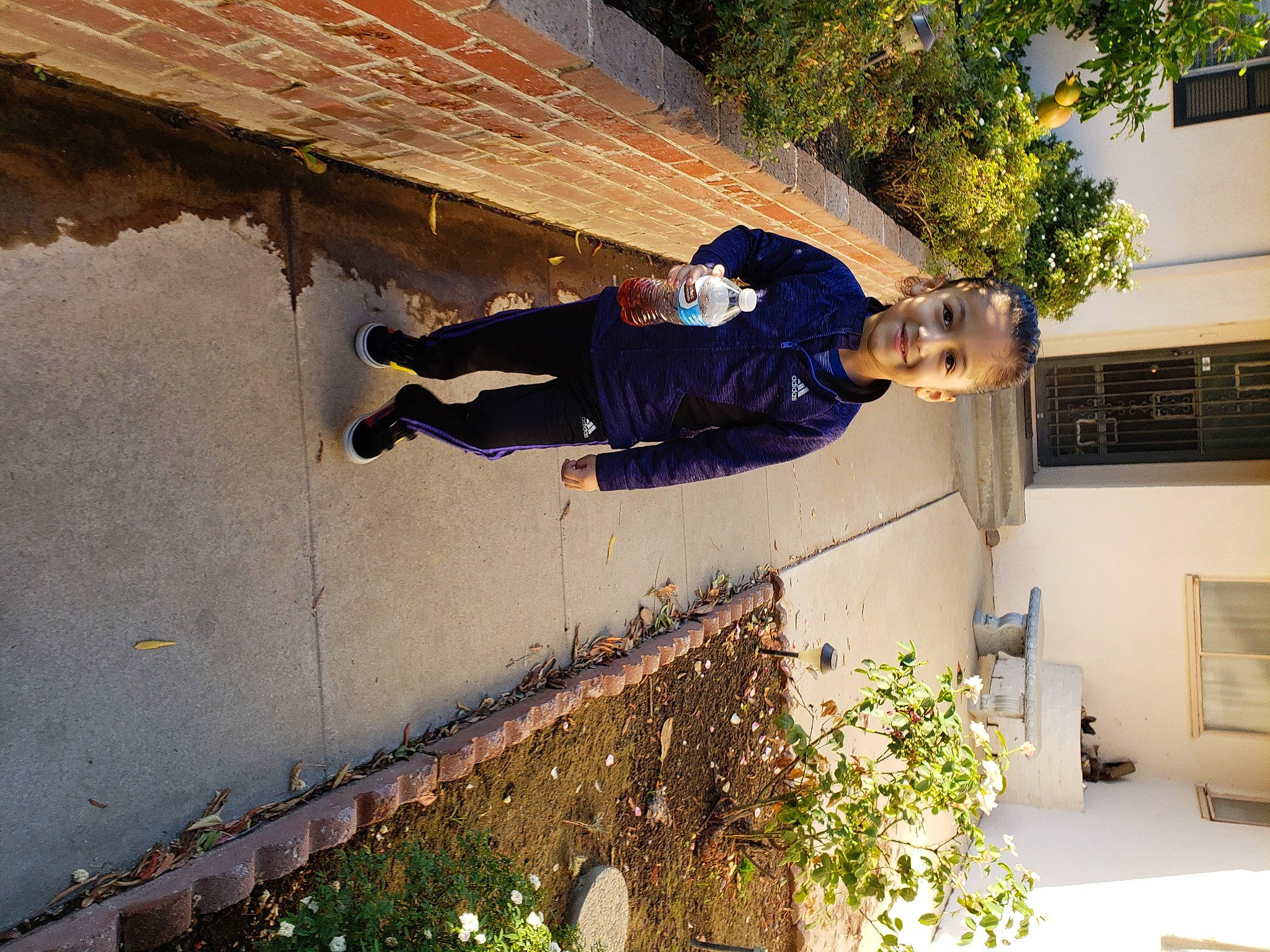 Deshawn is registered to the contest to win money with this photo: flip_acrobatic, freestyle_walking, house, joy, leisure, person, recreation, street_stunts, wall