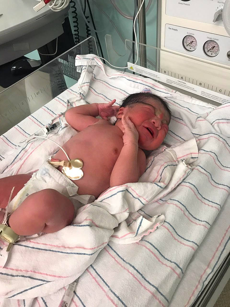 Stephon is registered to the contest to win money with this photo: baby, birth, child, childbirth, hospital_bed, nap, person, sleep