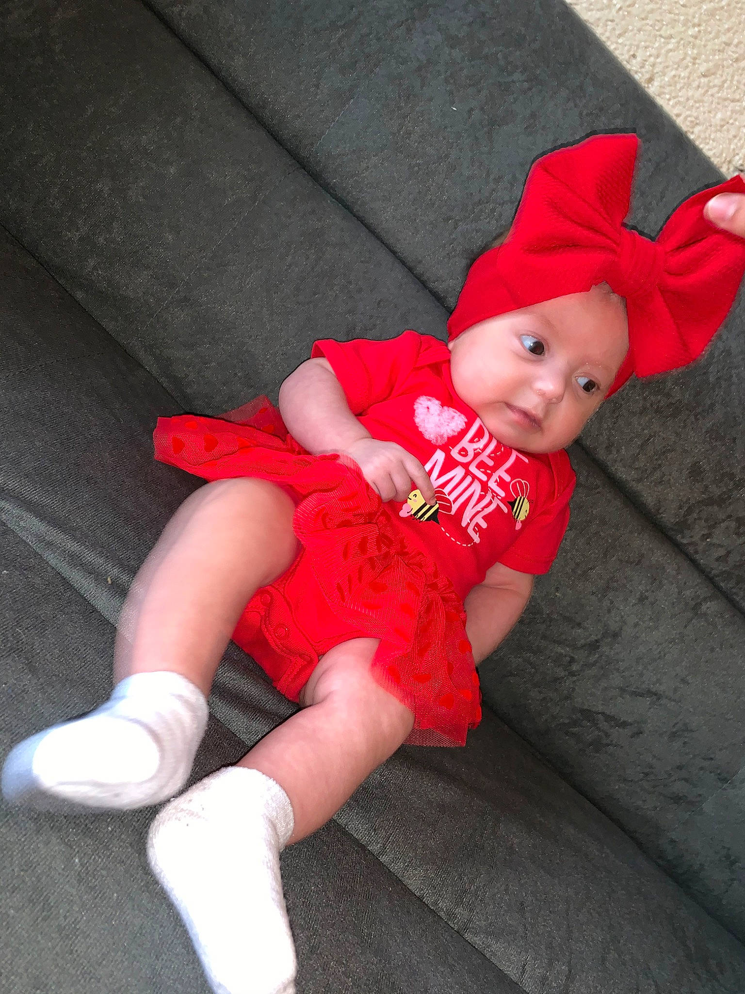 Leighton is registered to the contest to win money with this photo: child, costume, fictional_character, headgear, person, red, toddler, toy