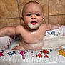 baby, bath, bathtub, bubbles, child, cute, face, foam, happy, indoor, inflatable, person, playful, sitting, skin, smiling, soap, tile, tub, water
