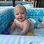 baby, blue, child, cute, diaper, fun, happy, infant, inflatable_pool, outdoor, playing, pool, purple, skin, smile, splash, summer, toy, water, yellow