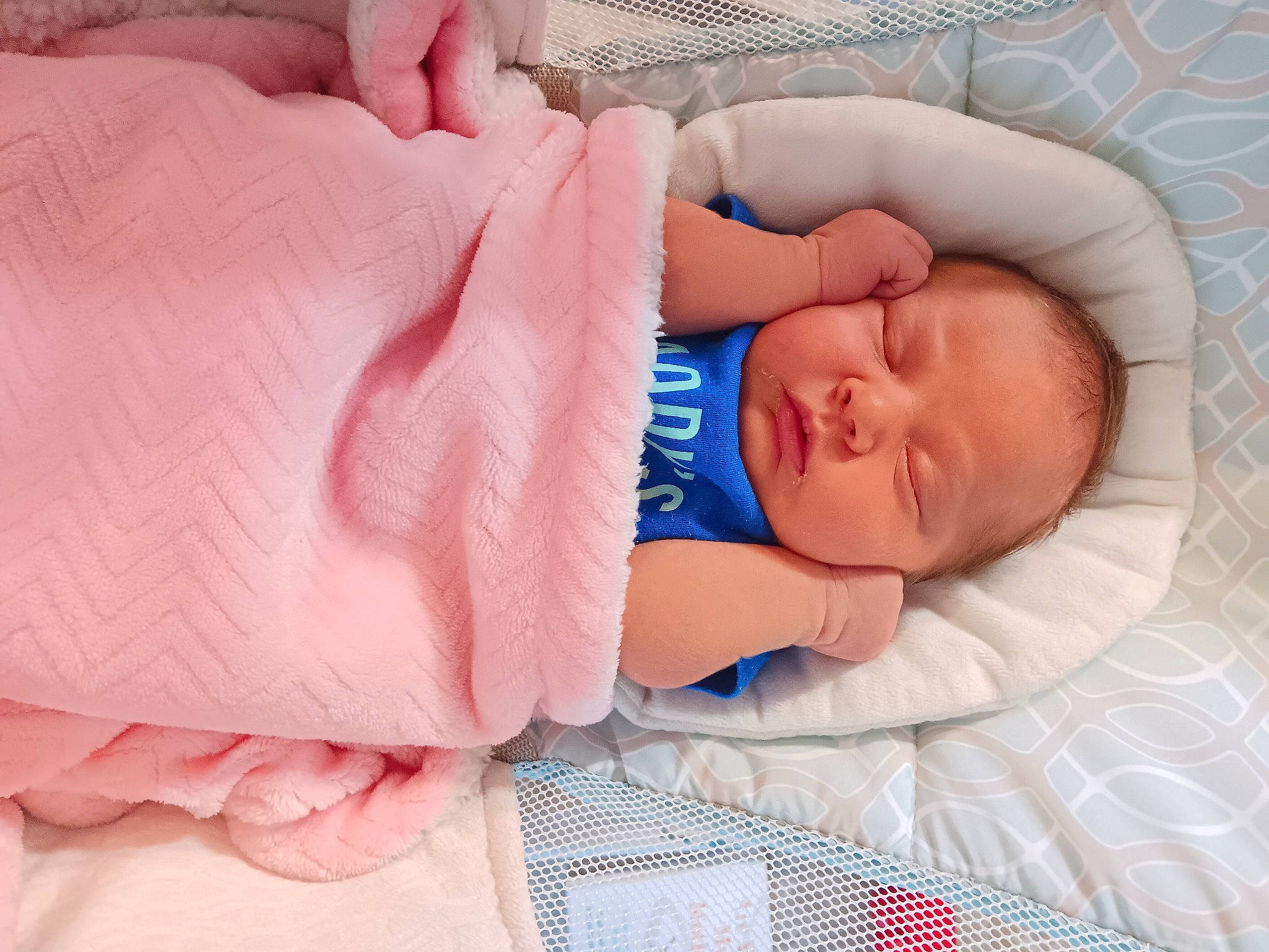 Isla joined the competition — help win amazing prizes! baby, baby_products, baby_sleeping, baby_toddler_clothing, bed, bed_sheet, bedding, bedtime, blanket, child, comfort, linens, nap, pattern, peach, person, room, skin, sleep, textile