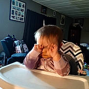 River joined the competition — help win amazing prizes! baby, toddler, high_chair, indoor, child, furniture, curtains, window, photography, person, face, clothing, hair, hand, table, room, living_room, blurred, seat, chevron_pattern