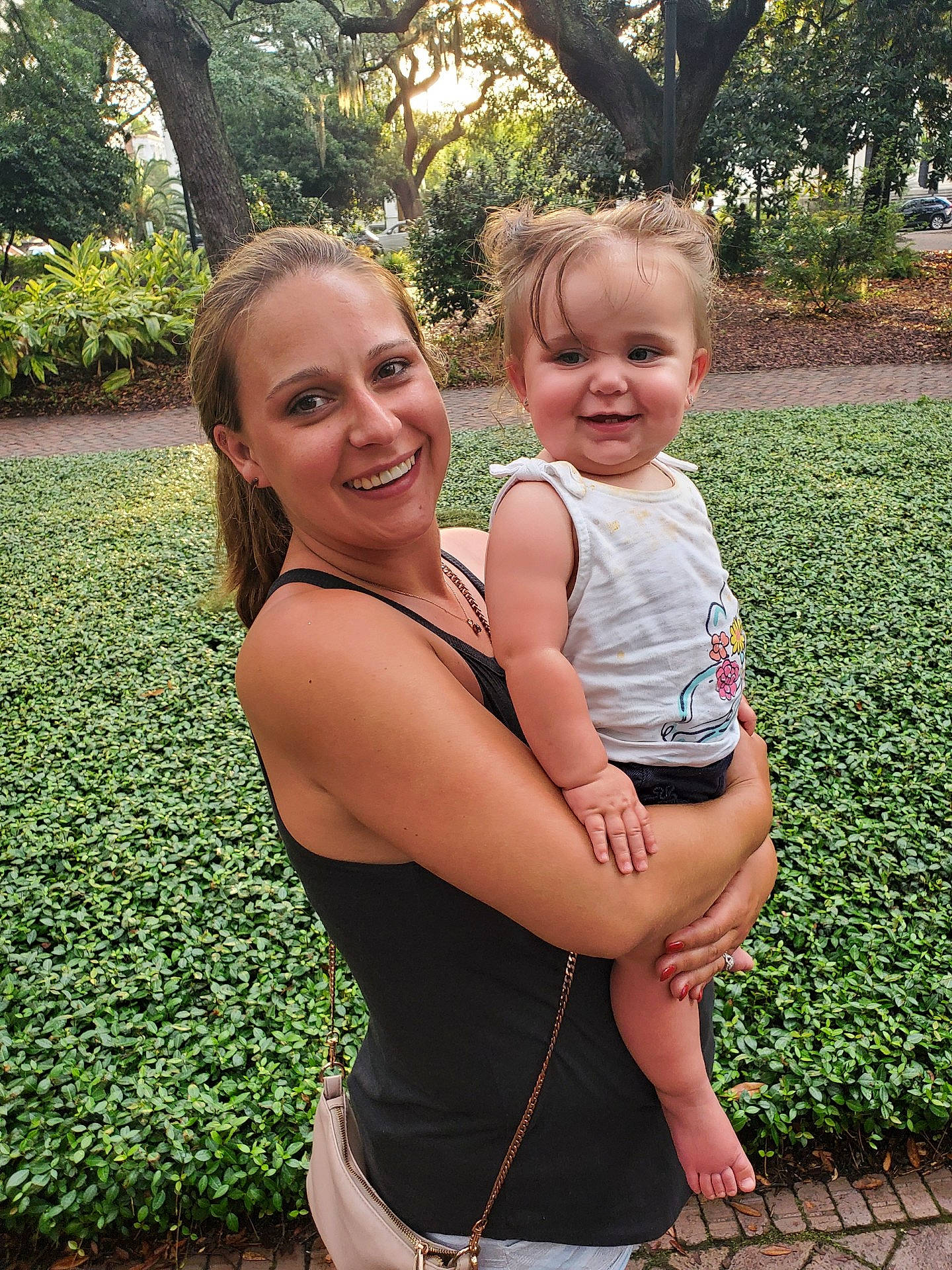 Emma is registered to the contest to win money with this photo: botany, eye, face, facial_expression, gesture, grass, hair, hairstyle, happy, human_body, joy, leg, organ, people_in_nature, person, photograph, plant, shoulder, skin, smile
