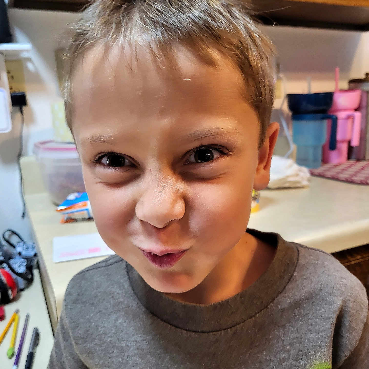 Bayler joined the competition — help win amazing prizes! blonde, bodypart, boy, child, clothing, face, finger, frown, hair, hand, happy, head, male, person, photography, portrait, shelf, smile, t_shirt, wood