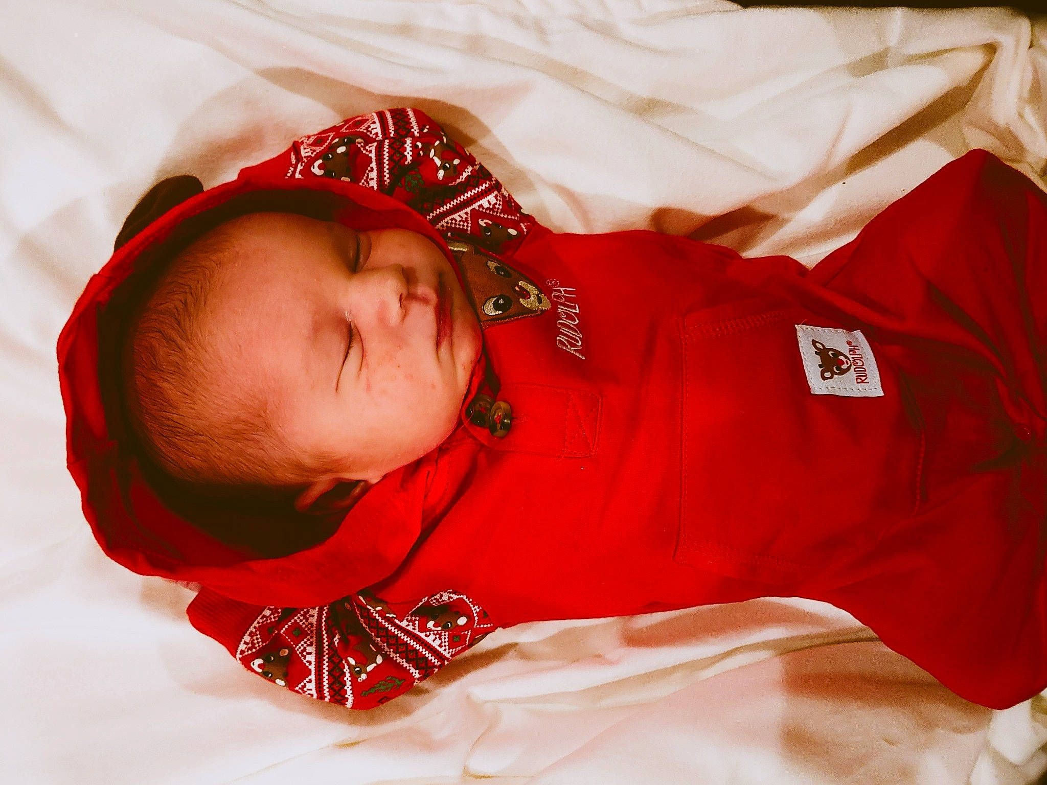 Joshua joined the competition — help win amazing prizes! baby, baby_toddler_clothing, bonnet, carmine, child, christmas, costume_accessory, lip, person, red, sleeve, textile, toddler