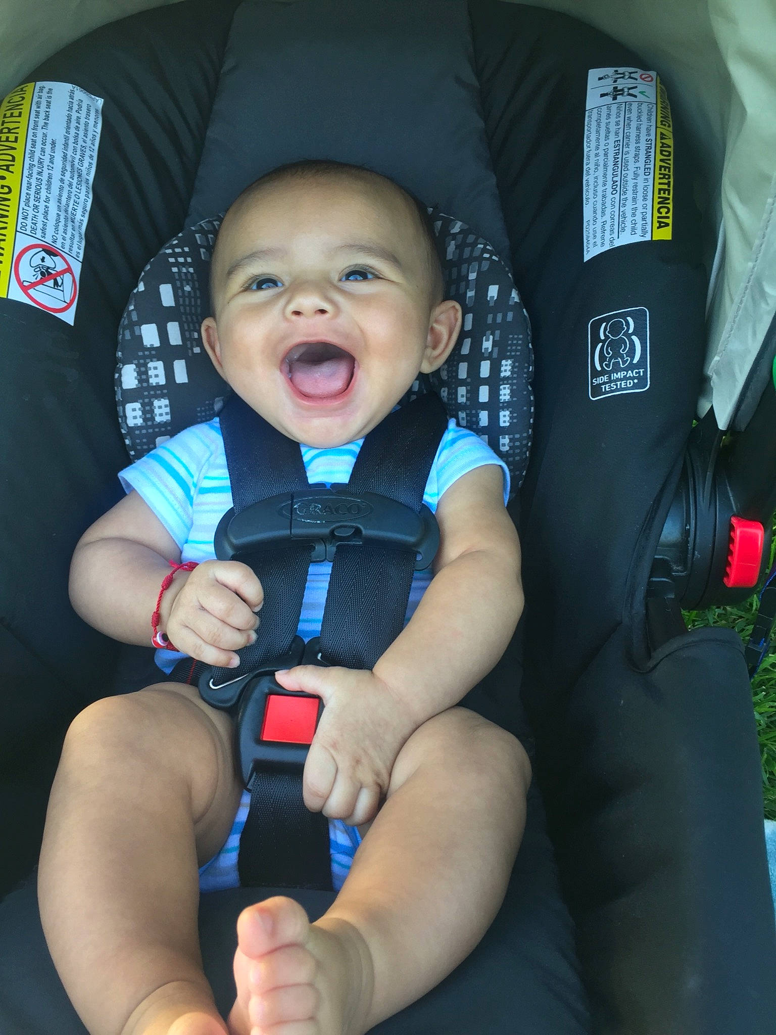 Esaias joined the competition — help win amazing prizes! baby, baby_carriage, baby_in_car_seat, baby_products, car_seat, child, comfort, finger, hand, person, product, seat_belt, toddler, vacation