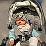 Erzabelle joined the competition — help win amazing prizes! baby, child, stroller, headband, bow, clothing, infant, smile, seatbelt, indoor, floor, person, footwear, socks, jacket, blanket, cute, portrait, baby_wear, baby_bib