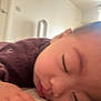 Erzabelle joined the competition — help win amazing prizes! baby, sleeping, close_up, face, child, indoors, soft_light, purple_clothing, peaceful, cozy, hand, head, eyelashes, skin, resting, infant, young_child, portrait, quiet, relaxed