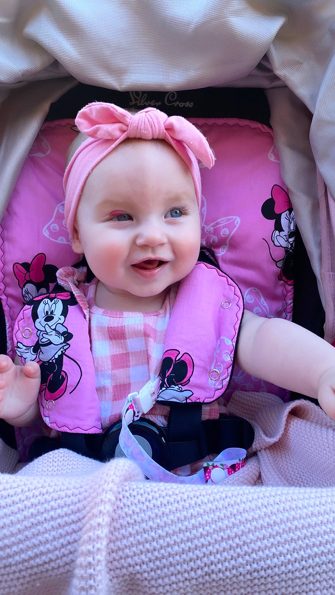 Siobhan is registered to the contest to win money with this photo: baby, baby_products, baby_toddler_clothing, cheek, child, comfort, eye, happy, head, headwear, iris, magenta, pattern, person, photograph, pink, purple, skin, sleeve, smile