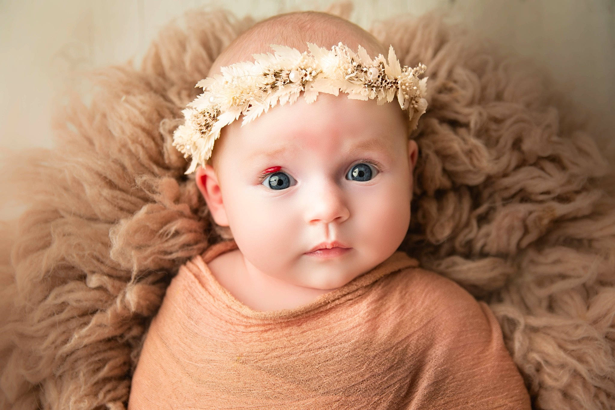 Siobhan joined the competition — help win amazing prizes! baby, baby_toddler_clothing, cap, clothing, ear, embellishment, eyebrow, eyelash, face, fawn, flash_photography, headband, headpiece, headwear, iris, lip, person, pink, skin, textile