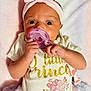 Imani joined the competition — help win amazing prizes! baby, infant, pacifier, headband, pink, bow, clothing, tutu, blanket, cute, portrait, newborn, hand, face, expression, soft, pastel, toddler, child, lying