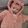 baby, infant, hoodie, pink, bow, headband, face, eyes, couch, fabric, texture, zipper, clothing, cute, child, portrait, indoor, soft, warm, cozy