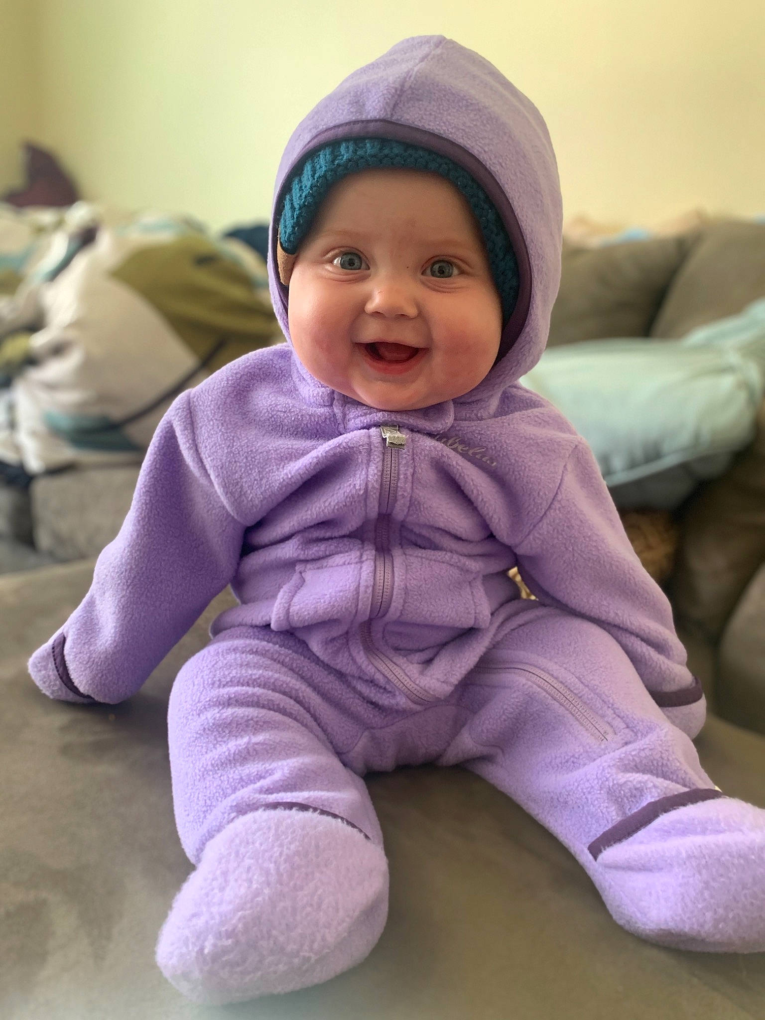 Blakelynn joined the competition — help win amazing prizes! baby, baby_toddler_clothing, cheek, child, face, head, headgear, headwear, hoodie, joy, outerwear, person, pink, purple, sitting, skin, sleeve, smile, toddler