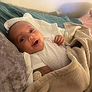 Sekai joined the competition — help win amazing prizes! baby, bed, blanket, child, comfort, cozy, cute, face, happy, indoors, infant, lying_down, peaceful, pillow, portrait, relaxation, smile, soft_texture, warm_lighting, white_clothing