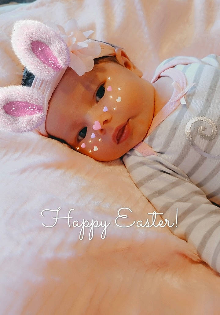 Amora joined the competition — help win amazing prizes! arm, baby, baby_toddler_clothing, child, comfort, doll, dress, eyelash, hair_accessory, happy, hat, headband, headpiece, headwear, jewellery, linens, peach, person, petal, textile