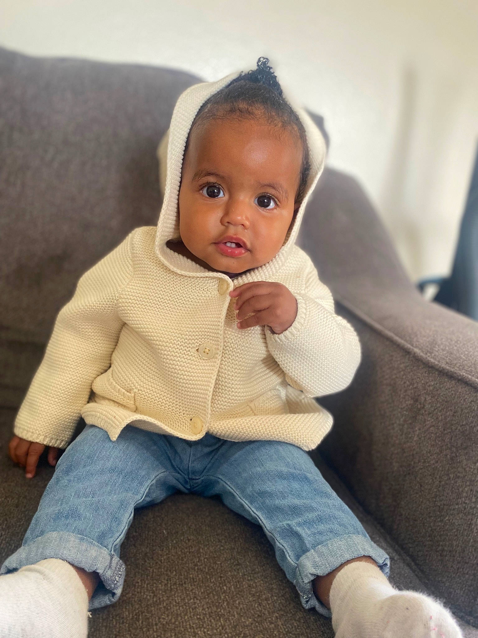 Alayah is registered to the contest to win money with this photo: baby, baby_toddler_clothing, cheek, child, clothing, comfort, denim, flooring, happy, head, jeans, nose, person, portrait_photography, sitting, skin, sleeve, t_shirt, toddler, white