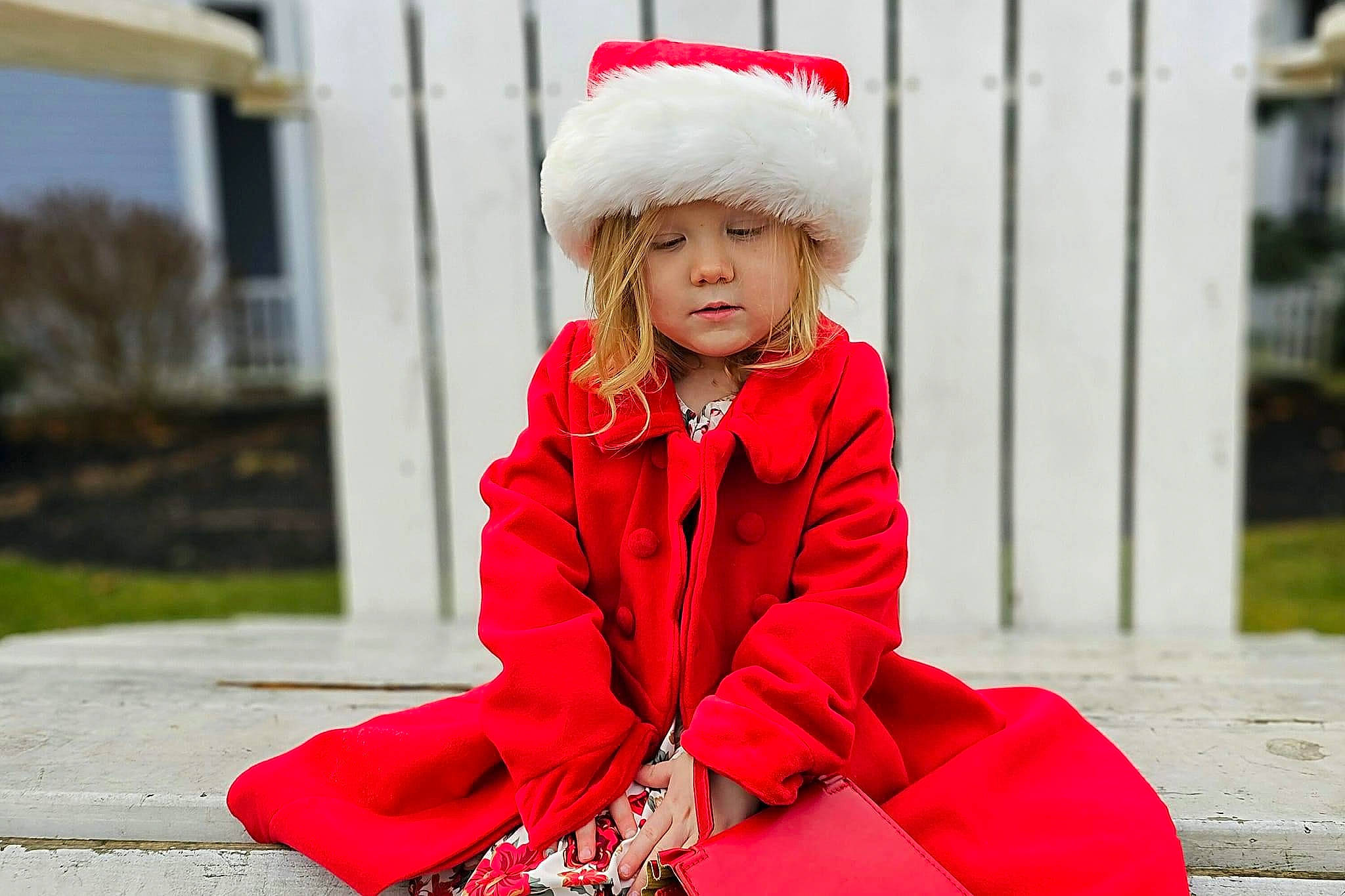 Haven is registered to the contest to win money with this photo: cap, child, child_model, costume, eye, face, fun, fur, grass, happy, headwear, holiday, leisure, magenta, person, pink, portrait_photography, red, sitting, sleeve