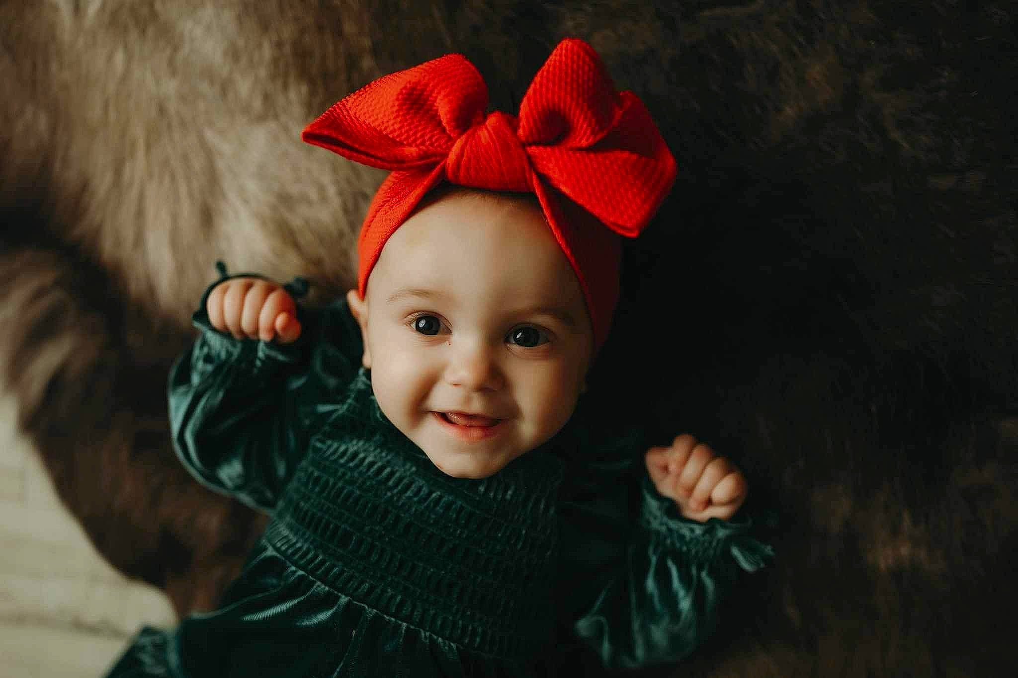 Haisleigh is registered to the contest to win money with this photo: baby, baby_toddler_clothing, cap, child, chin, christmas, costume_hat, fashion_accessory, fur, hair_accessory, happy, headgear, holiday, joy, knit_cap, lip, outerwear, person, sleeve, smile