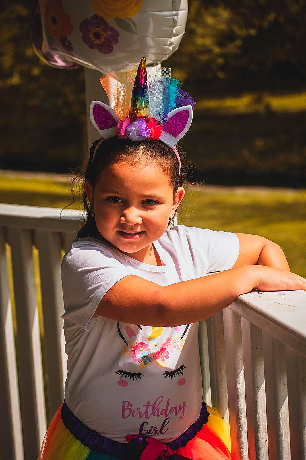 Sofia is registered to the contest to win money with this photo: balloon, birthday, child, ear, fun, happy, head, joy, party, party_hat, party_supply, person, pink, play, smile, toddler, vacation, world