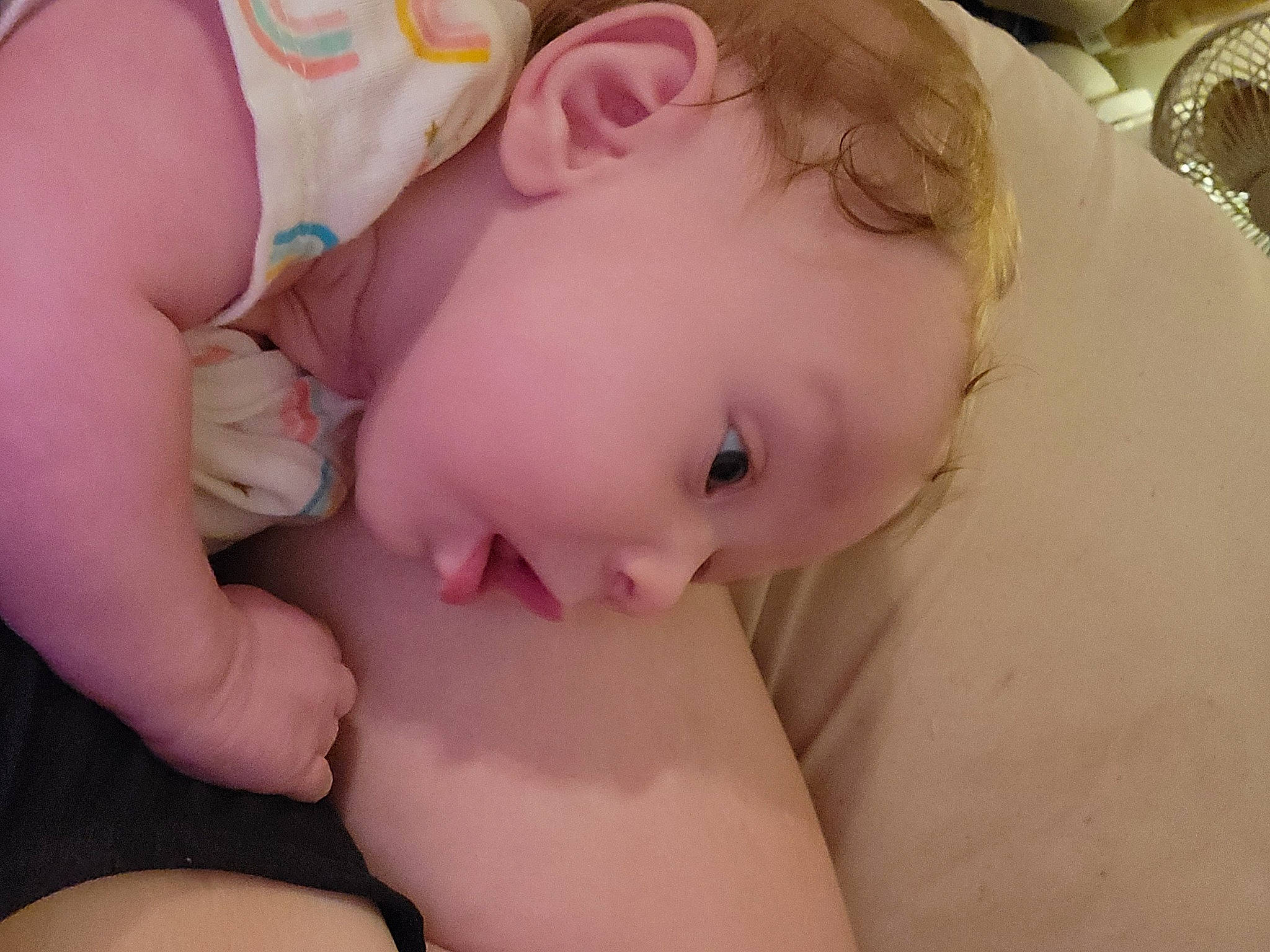 Crystal is registered to the contest to win money with this photo: abdomen, baby, baby_toddler_clothing, cheek, chest, comfort, eye, eyelash, finger, human_body, mechanical_fan, mouth, nail, neck, person, pink, skin, stomach, thumb, toddler