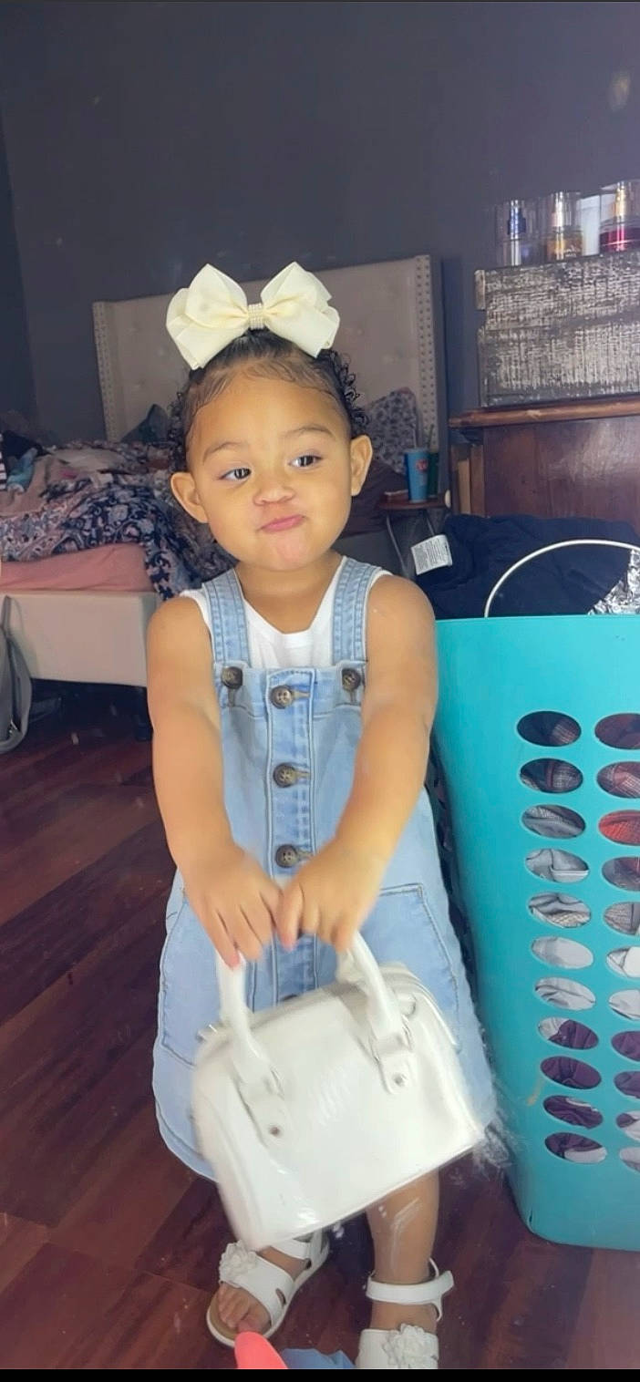 Amessia Klaire is registered to the contest to win money with this photo: baby, baby_toddler_clothing, chair, child, cool, dress, electric_blue, flash_photography, fun, hairstyle, happy, neck, organ, person, product, sitting, skin, sleeve, t_shirt, toddler