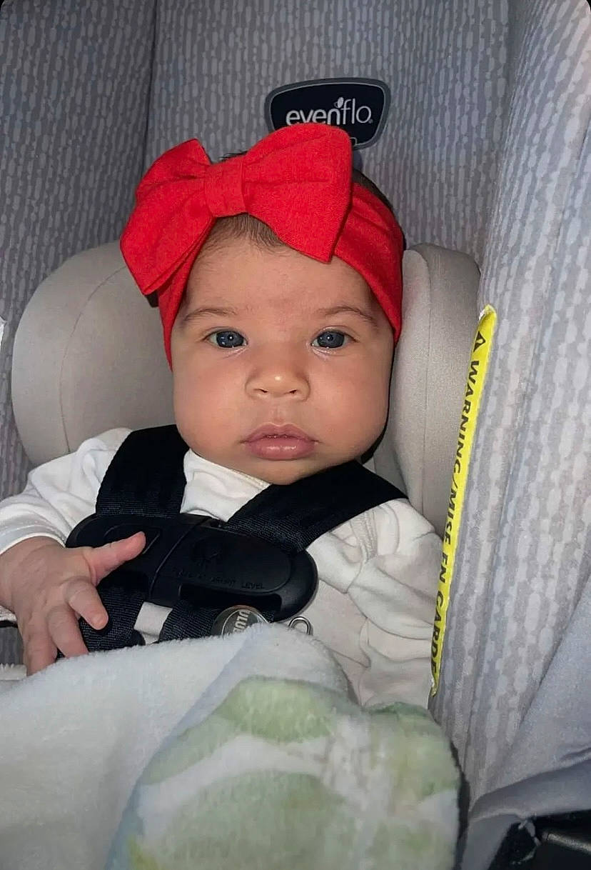 Leilani joined the competition — help win amazing prizes! baby, baby_carriage, baby_in_car_seat, baby_products, baby_safety, baby_toddler_clothing, cap, car_seat, cheek, child, comfort, eyebrow, face, fashion_accessory, headwear, iris, outerwear, person, product, sitting