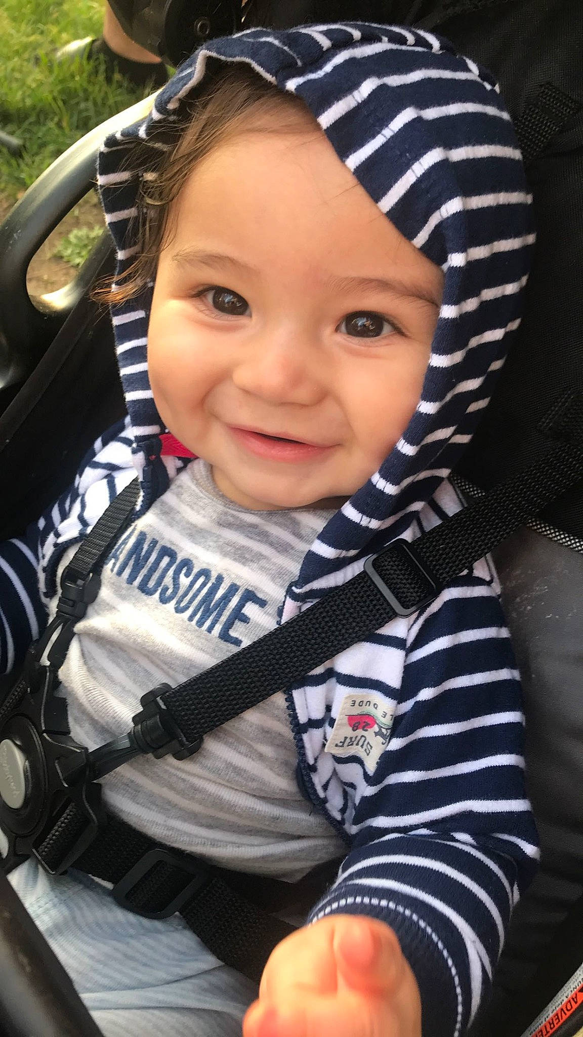 Emmanuel is registered to the contest to win money with this photo: baby, baby_carriage, baby_products, car, car_seat, cheek, child, cool, headwear, joy, person, product, skin, smile, toddler