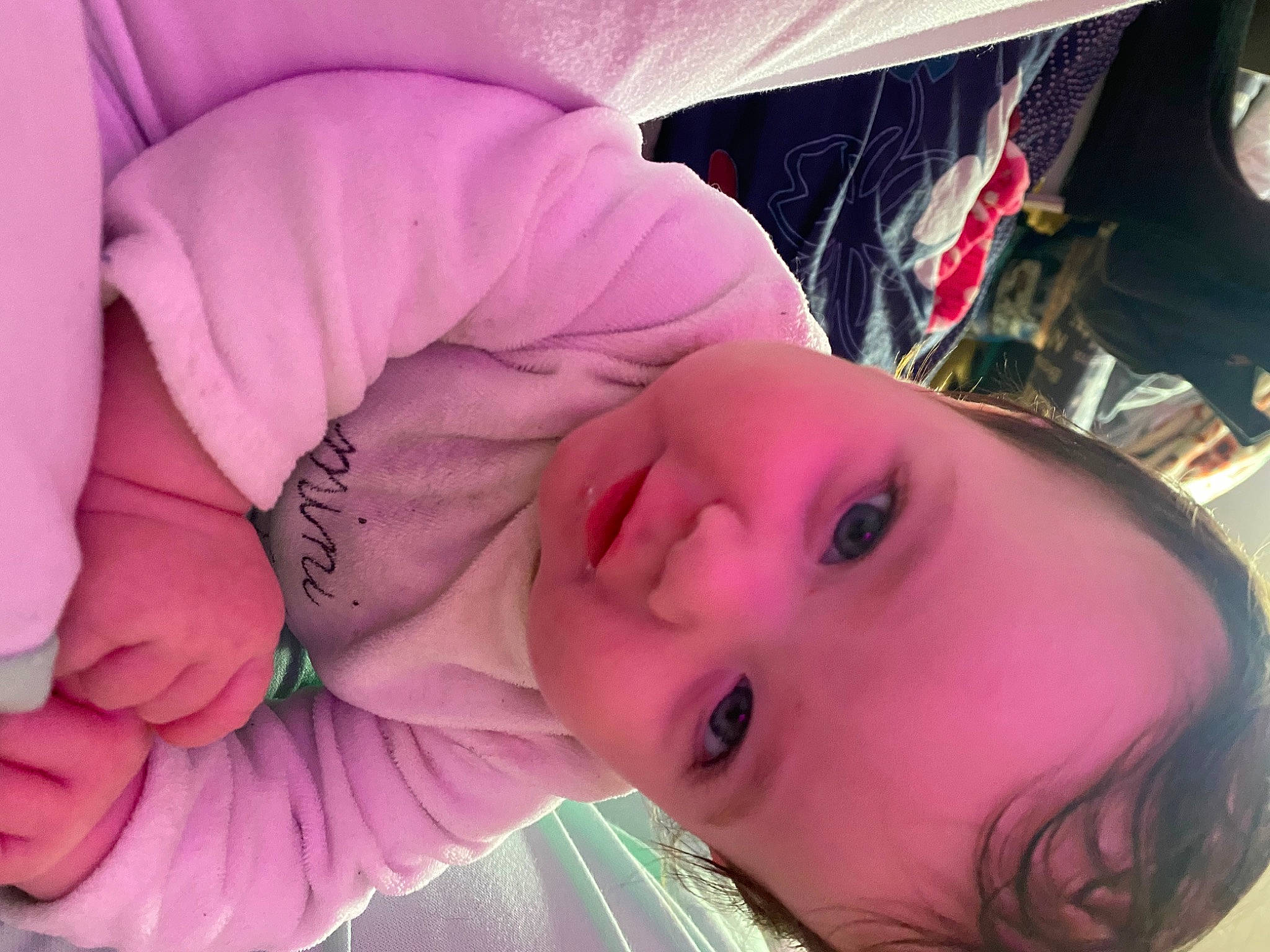 Ilyana participe au concours pour gagner de l'argent avec cette photo : baby, cheek, eye, eyebrow, eyelash, face, head, human_body, iris, light, lip, mouth, nose, person, pink, plant, purple, skin, smile, textile