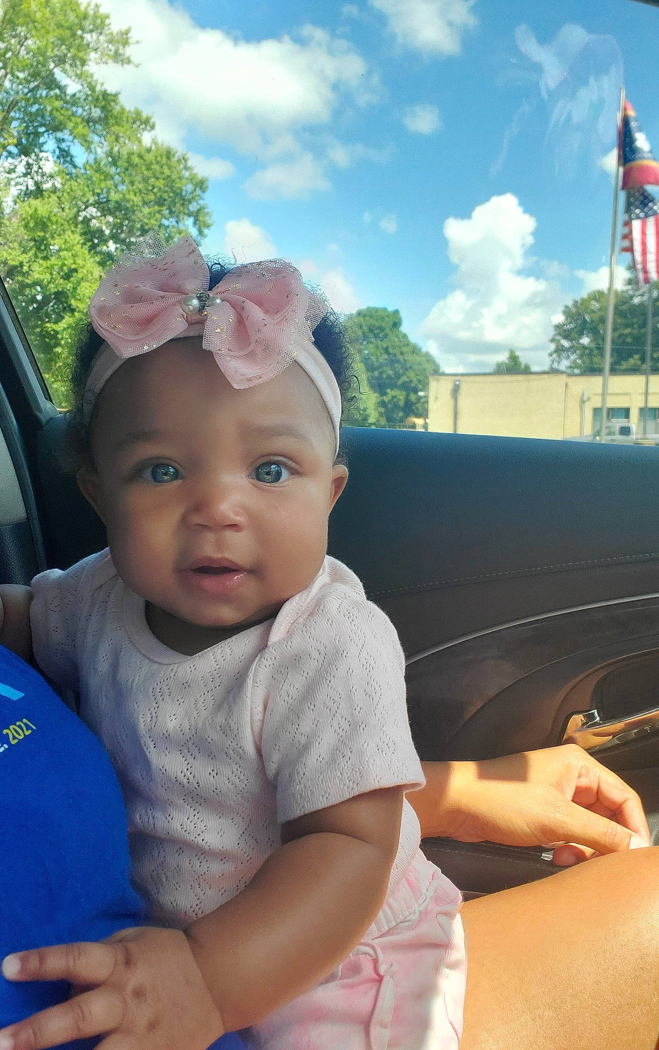 Odyssey joined the competition — help win amazing prizes! baby, baby_toddler_clothing, blue, cap, cloud, couch, flag, fun, grass, hand, happy, hat, leisure, person, pink, skin, sky, sun_hat, toddler, tree