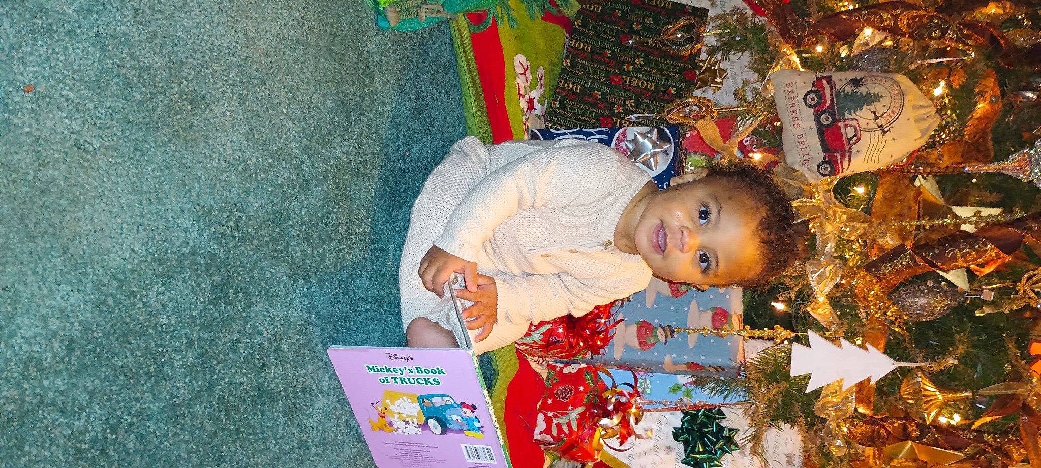 Damon joined the competition — help win amazing prizes! baby_toddler_clothing, book, child, christmas, christmas_decoration, christmas_eve, christmas_ornament, christmas_tree, event, fun, happy, holiday, holiday_ornament, ornament, person, publication, room, smile, toddler, tradition