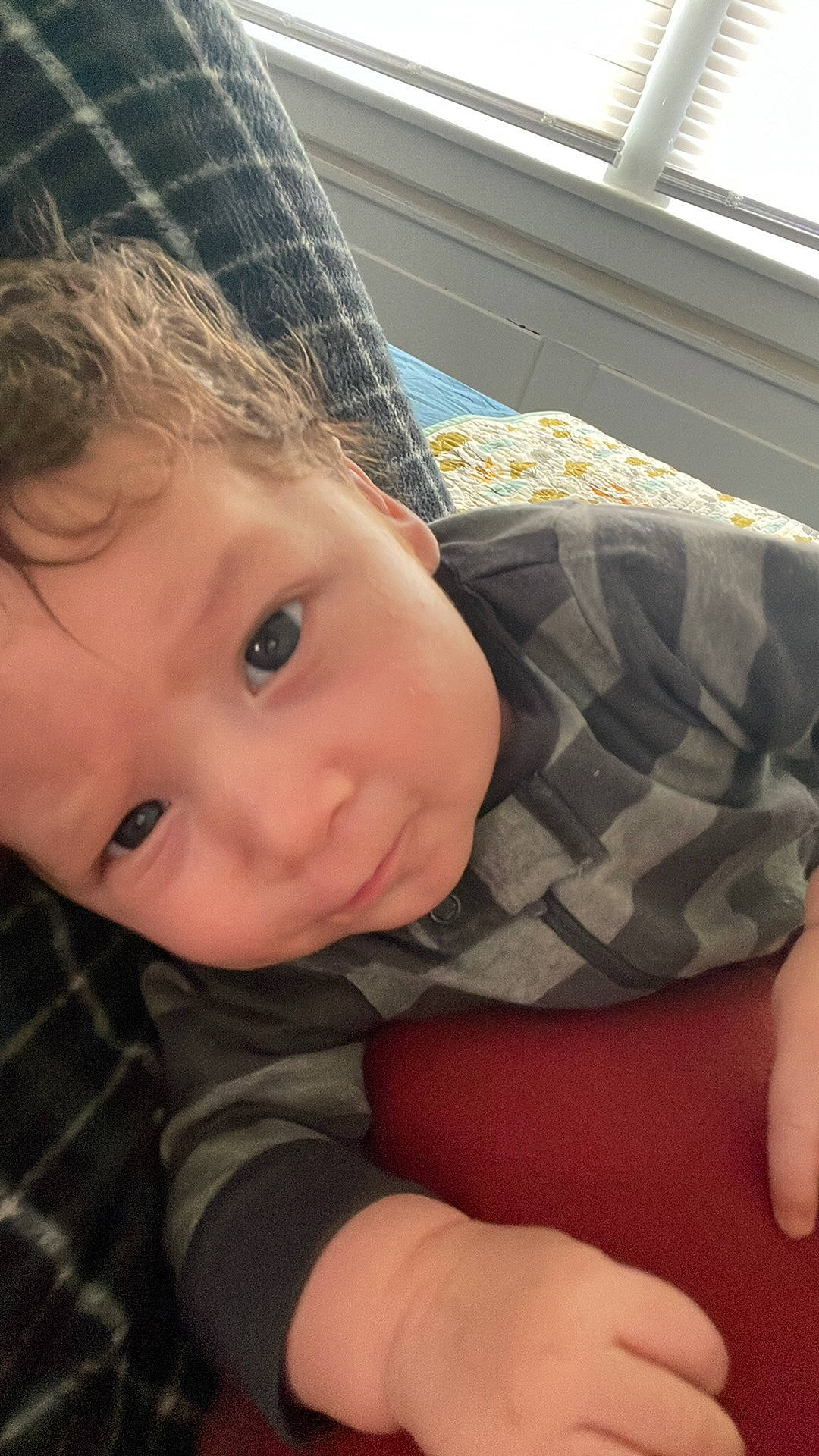 Kyle joined the competition — help win amazing prizes! baby_toddler_clothing, cheek, comfort, eye, eyebrow, flooring, grass, happy, iris, lip, mouth, nose, pattern, person, plaid, skin, smile, textile, toddler, window