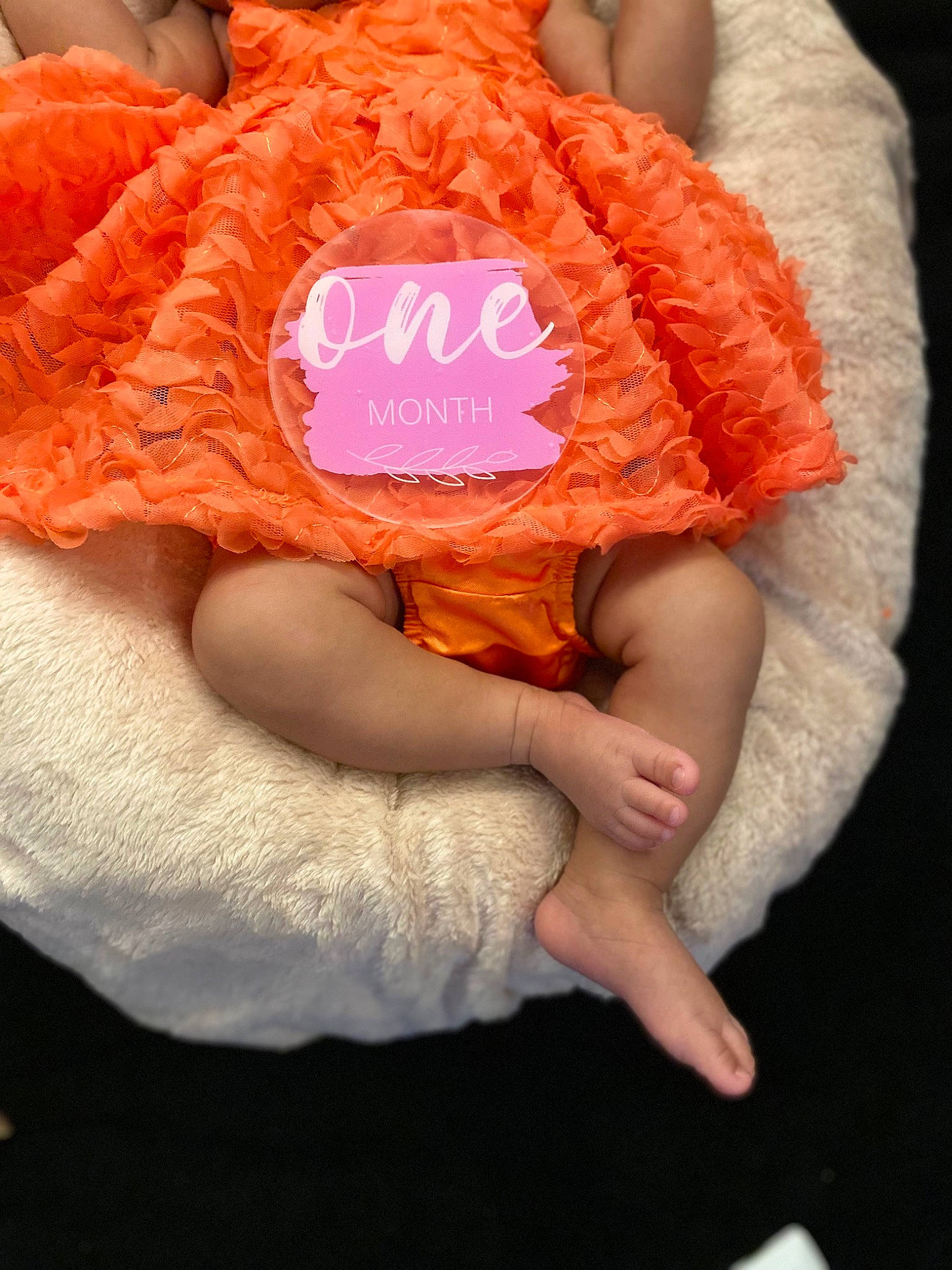 Gianna is registered to the contest to win money with this photo: baby, baby_products, baby_toddler_clothing, cap, child, comfort, crochet, finger, font, gesture, hat, linens, nail, orange, peach, person, sleeve, thumb, toddler, wool