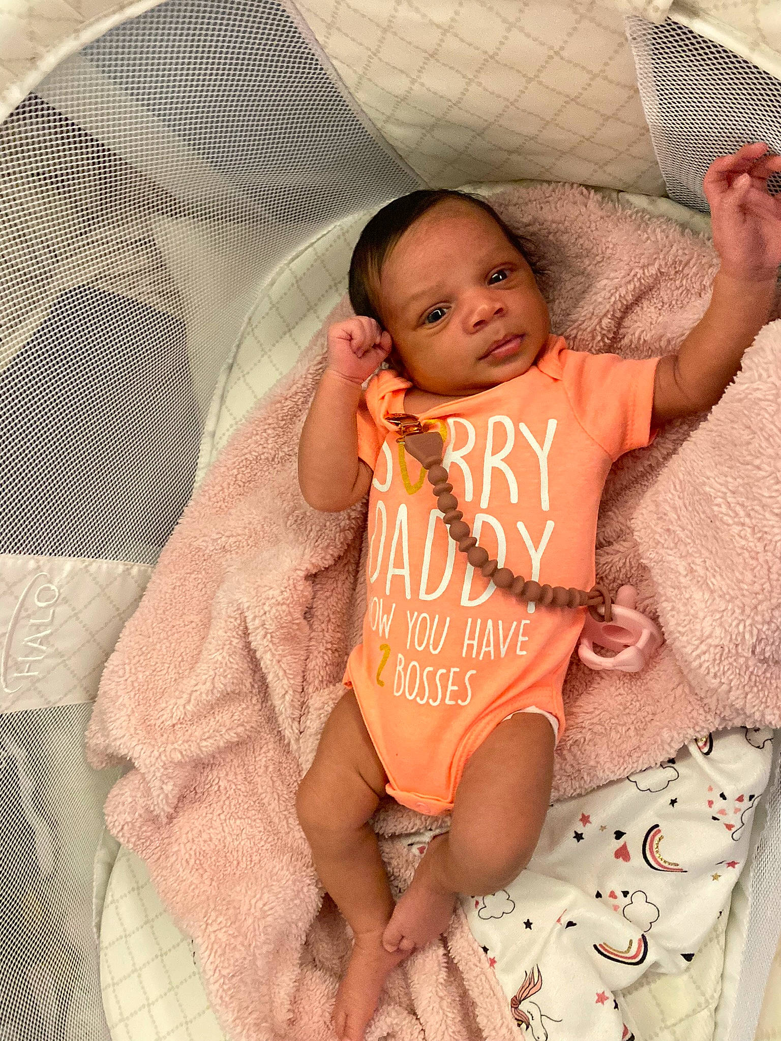 Gianna is registered to the contest to win money with this photo: baby, baby_products, baby_toddler_clothing, child, comfort, event, face, facial_expression, finger, happy, head, leg, linens, mouth, person, product, skin, sleeve, stomach, t_shirt