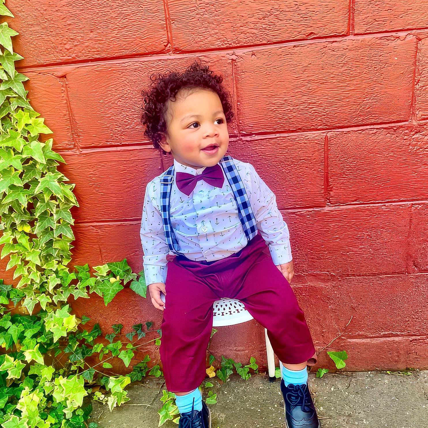 Kyliek is registered to the contest to win money with this photo: accessories, architecture, boy, brick, child, clothing, face, footwear, formalwear, head, ivy, leaf, male, pants, person, photography, plant, portrait, shoe, tie