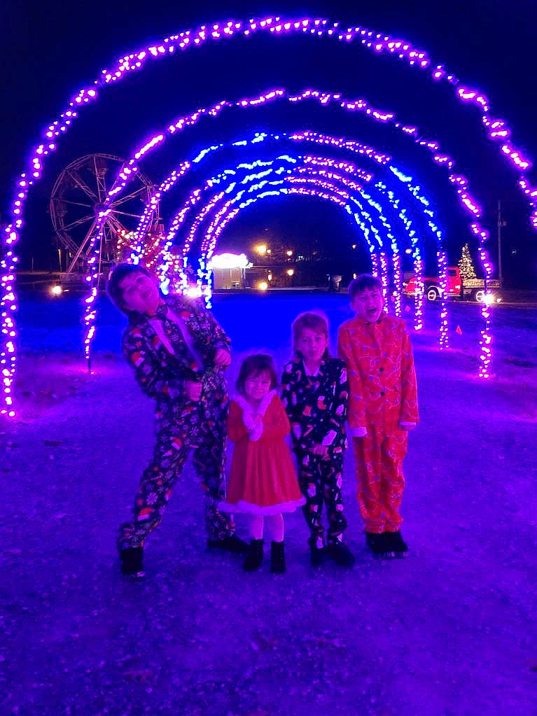 Katalina joined the competition — help win amazing prizes! christmas_decoration, christmas_lights, darkness, electric_blue, electricity, entertainment, event, fun, holiday, joy, lighting, magenta, midnight, neon, person, pink, plant, purple, toddler, violet