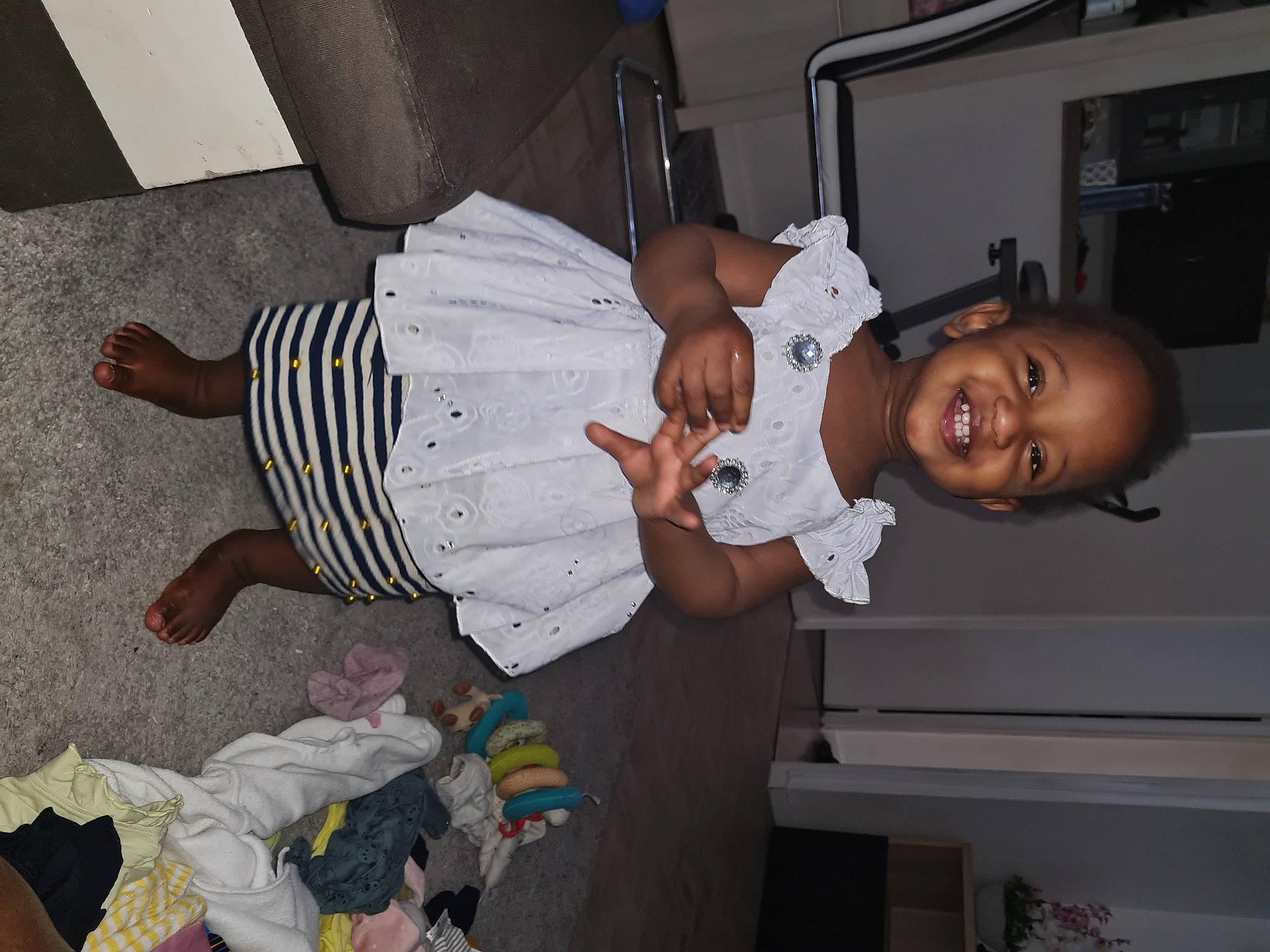 Nery Aissatou participe au concours pour gagner de l'argent avec cette photo : baby, baby_toddler_clothing, black, child, comfort, event, fun, hat, home_appliance, joy, person, picture_frame, room, smile, sock, t_shirt, television, toddler