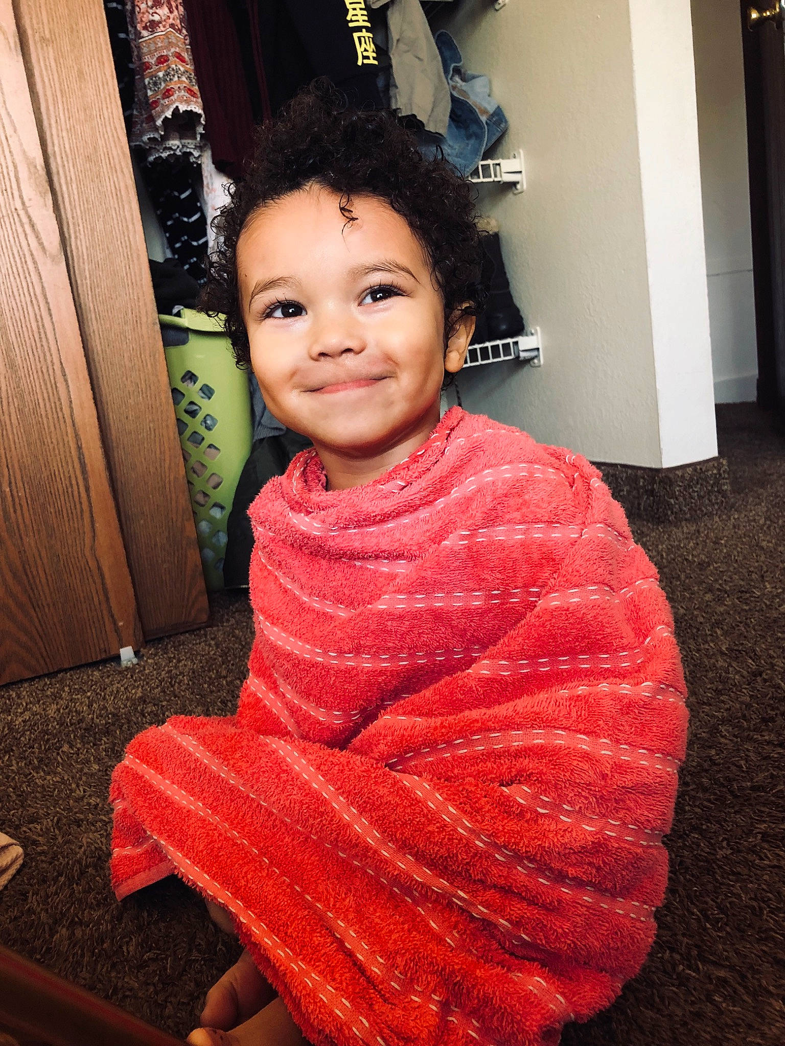 Lucius is registered to the contest to win money with this photo: baby, beauty, black_hair, cheek, child, daughter, dress, face, flesh, hairstyle, head, human, joy, person, pink, sitting, skin, smile, temple, textile