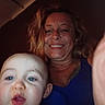 Amelia joined the competition — help win amazing prizes! adult, blue_eyes, blurry_finger, casual, child, close_up, curly_hair, duck_face, face, family, happy, indoor, photography, portrait, selfie, smiling, toddler, together, warm_lighting, woman