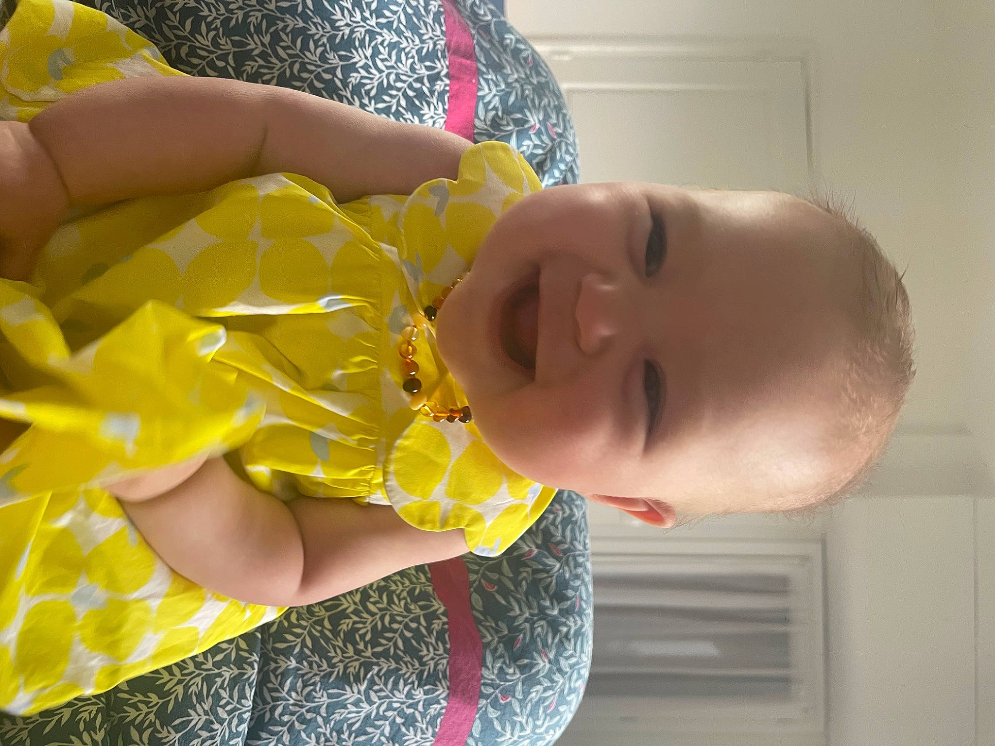 Maëlle participe au concours pour gagner de l'argent avec cette photo : arm, baby, baby_laughing, baby_toddler_clothing, dress, eye, finger, fun, hand, happy, head, human_body, human_leg, joy, nose, pattern, person, skin, smile, thumb