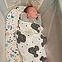 Antonio joined the competition — help win amazing prizes! baby, bassinet, blanket, child, close_up, cozy, crib, indoors, infant, mesh_sides, newborn, patterned_blanket, quiet, resting, sleeping, sleepwear, soft_lighting, suffocation_hazard, text, warning_label