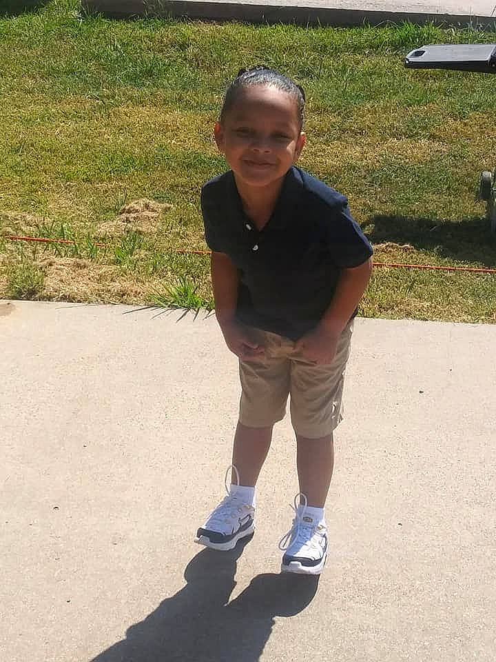 Jadon is registered to the contest to win money with this photo: athletic_shoe, balance, bench, bermuda_shorts, cap, footwear, joy, outdoor_bench, outdoor_furniture, outdoor_shoe, outdoor_table, person, shadow, shoe, shorts, sneakers, style, summer, walking_shoe